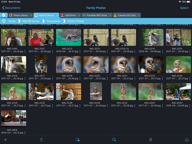 Use FileBrowser Professional to browse the photos on your drive.