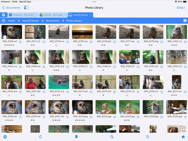 Use FileBrowser Professional to browse the photos on your drive.